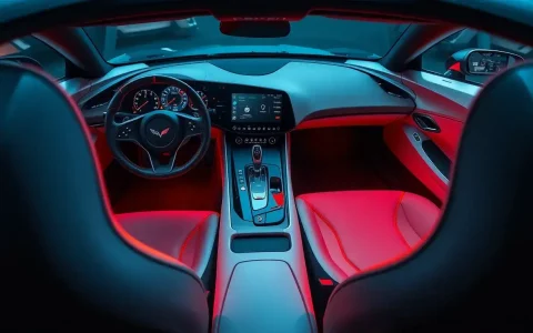 What are the unique features of the Corvette E-Ray's interior